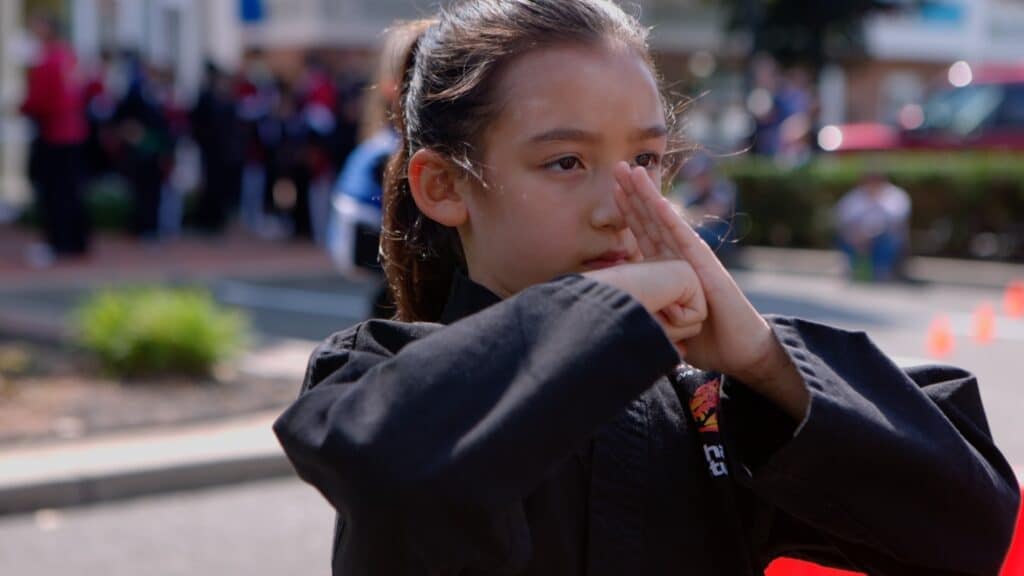 martial arts student showing focus in front position
